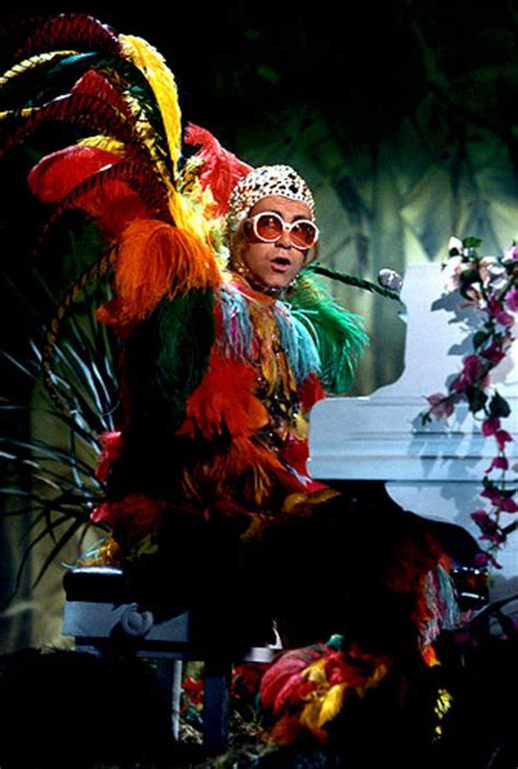 Elton John had a legendary Louis XIV-inspired look for his 50th birthday, accented with a massive powdered wig balancing a warship on-top, a long train, and a thousand more intricate details ...